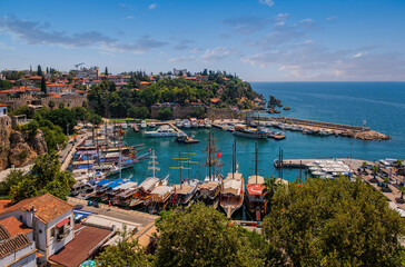 Naklejka na ściany i meble Old harbor in Kaleici, Antalya, Turkey - travel background. August 2020. Long exposure picture