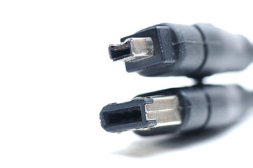 Cable with 1394 and iLink plugs on white background