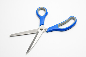 Tailors scissors on a white background