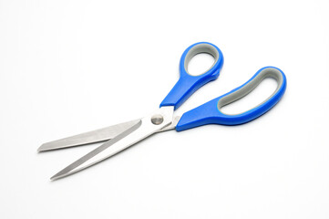 Tailors scissors on a white background