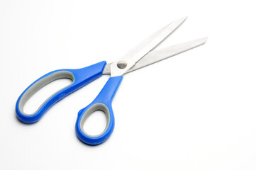 Tailors scissors on a white background