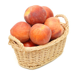 Ripe peach fruit isolated in basket on white background