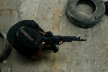 airsoft tactical training indoors with assault rifle