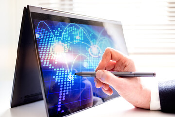 hand touching tablet screen global connection