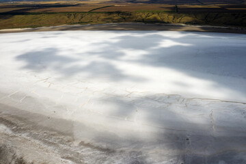 Amazing beauty of drying Kuyalnik estuary from bird's flight. Top view of coastal zone of ecological reserve Kuyalnik estuary, Odessa, Ukraine. Aerial view from drone to sea estuaries in suburban