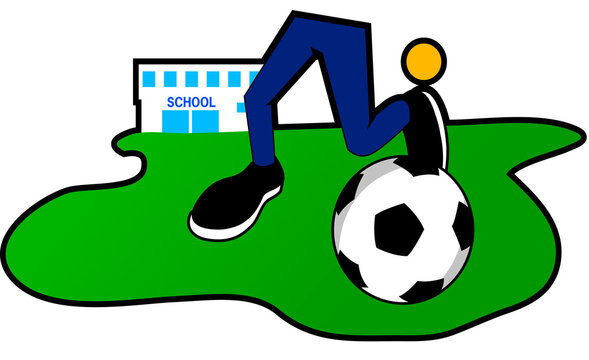 Low section view of a boy dribbling a soccer ball