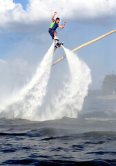 Rocket Man Flying on Lake Arlington with water jet boots.