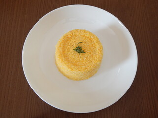 Traditional Brazilian couscous (cuscus/cuscuz). Tropical food. The Brazilian Couscous from the Northeast Region also known as Corn Couscous is a nutritious, cheap and a really simple recipe to make.