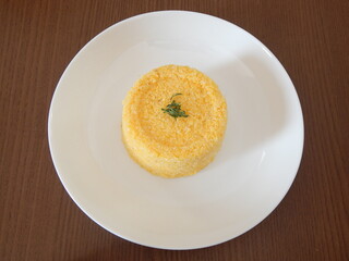 Traditional Brazilian couscous (cuscus/cuscuz). Tropical food. The Brazilian Couscous from the Northeast Region also known as Corn Couscous is a nutritious, cheap and a really simple recipe to make.