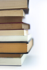 pile of used and new books vertical image