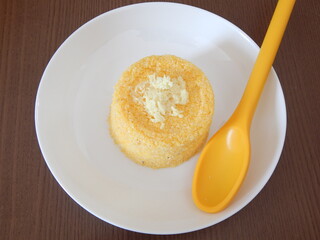 Traditional Brazilian couscous (cuscus/cuscuz). Tropical food. The Brazilian Couscous from the Northeast Region also known as Corn Couscous is a nutritious, cheap and a really simple recipe to make.