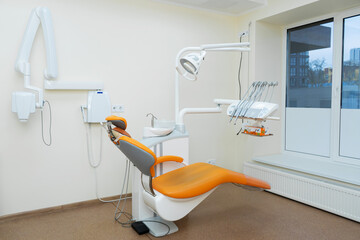 Interior stylish modern dentist office in orange style.