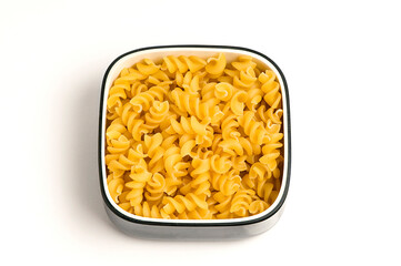 High angle view of a bowl of raw fusilli pasta