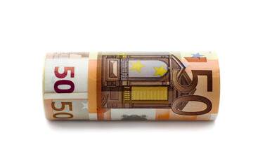 Monetary denominations laid in a vase,of 50 euros rolled up