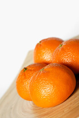 Close-up of four oranges