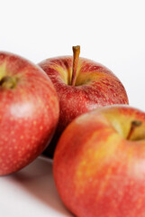 Close-up of three apples
