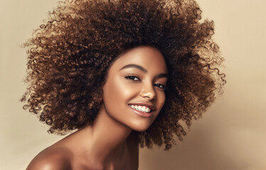 Beautiful black woman . Beauty portrait of african american woman with clean healthy skin on beige...