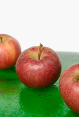 High angle view of three apples