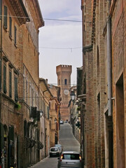Italy, Marche, Ostra downtown medieval street. The place is warm and attractive.