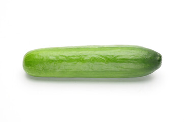 Ripe cucumber on a white background
