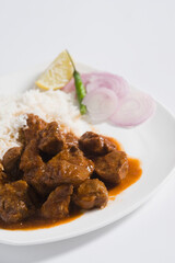 Close-up of mutton curry served with rice