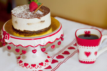 High angle view of a chocolate mousse pastry with a cup of coffee