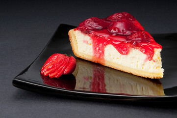 Close-up of a strawberry cheesecake on a tray