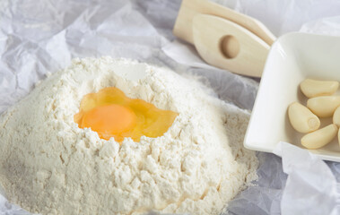 Close-up of egg yolk with flour