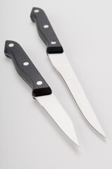Close-up of two knives