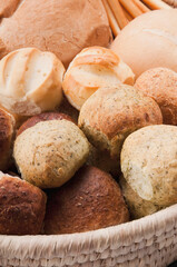 Close-up of a basket of assorted bread rolls and scones