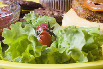 Close-up of lettuce salad with a hamburger