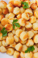 Close-up of fritters garnished with parsley