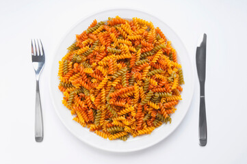 High angle view of multi colored fusilli