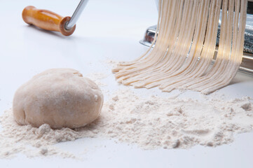 Pasta maker making spaghetti