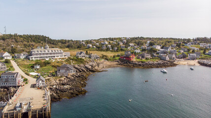 Fototapeta na wymiar Boats in the bay on Monhegan Island in Maine United States