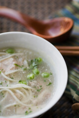 High angle view of pea and noodle clear soup