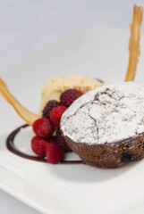 Close-up of fruit cake served with berries