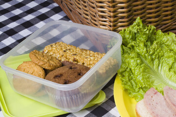 Close-up of salami sandwich with cookies