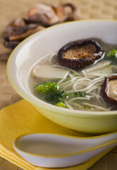Close-up of a bowl of mushroom and noodle soup