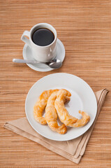High angle view of croissants served with coffee