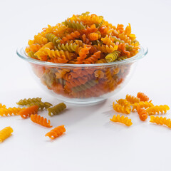 Close-up of a bowl of uncooked fusilli
