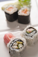 Close-up of uramaki and futomaki sushi