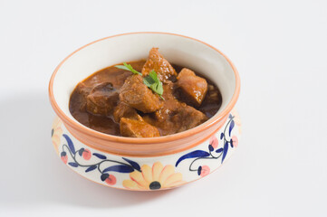 Close-up of mutton curry served in a bowl