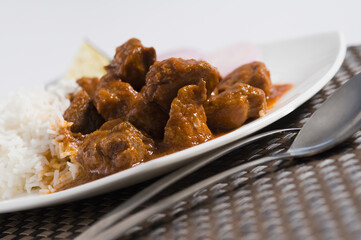 Close-up of mutton curry served with rice