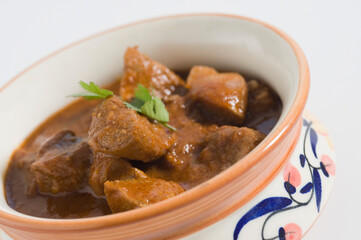 Close-up of mutton curry served in a bowl
