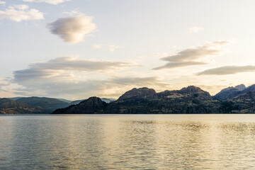 calm early morning at okanagan lake summer time british columbia canada.