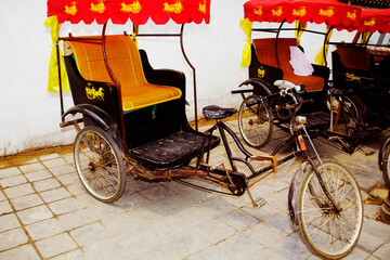 Fototapeta na wymiar China, Shandong, Qufu, cycle rickshaws