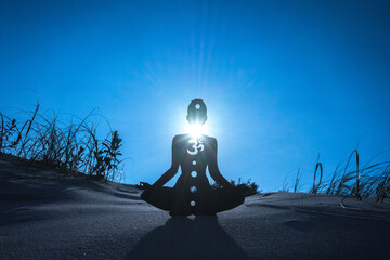 yoga position silhouette in contrasting sun, Throat chakra