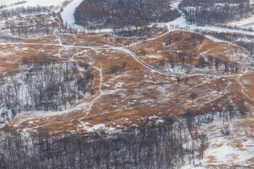 View from above. Agricultural fields in winter