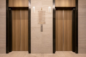 Front of Two close elevators in  old retro style Hotel © pixs4u